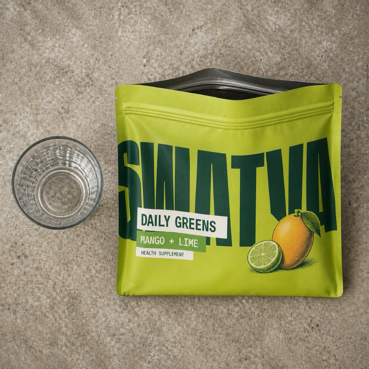 An empty pouch and a rinsed glass on a kitchen counter